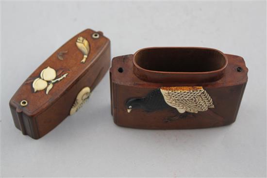 A Japanese cherrywood, ivory, horn, mother of pearl and wood inlaid single case inro, 19th century, 9cm.